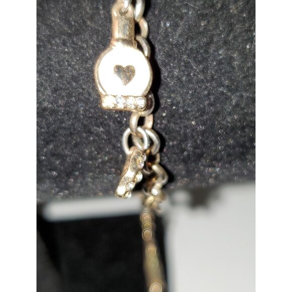 A Guess Women's Charm Bracelet Gold Tone Chain Lipstick Rhinestone - Picture 2 of 11